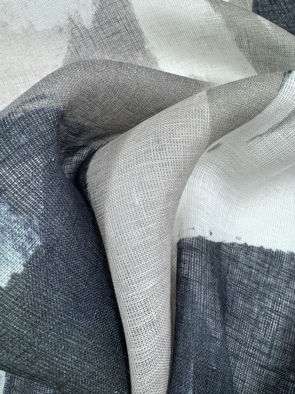 Close-up of coastal abstract linen gauze showing the open weave