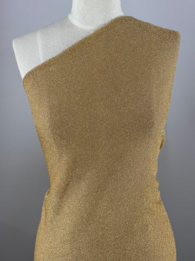 Gold metallic textured knit fabric