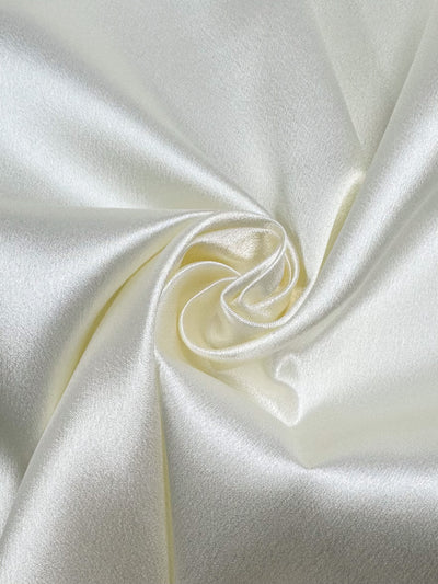 Cream satin back crepe fabric