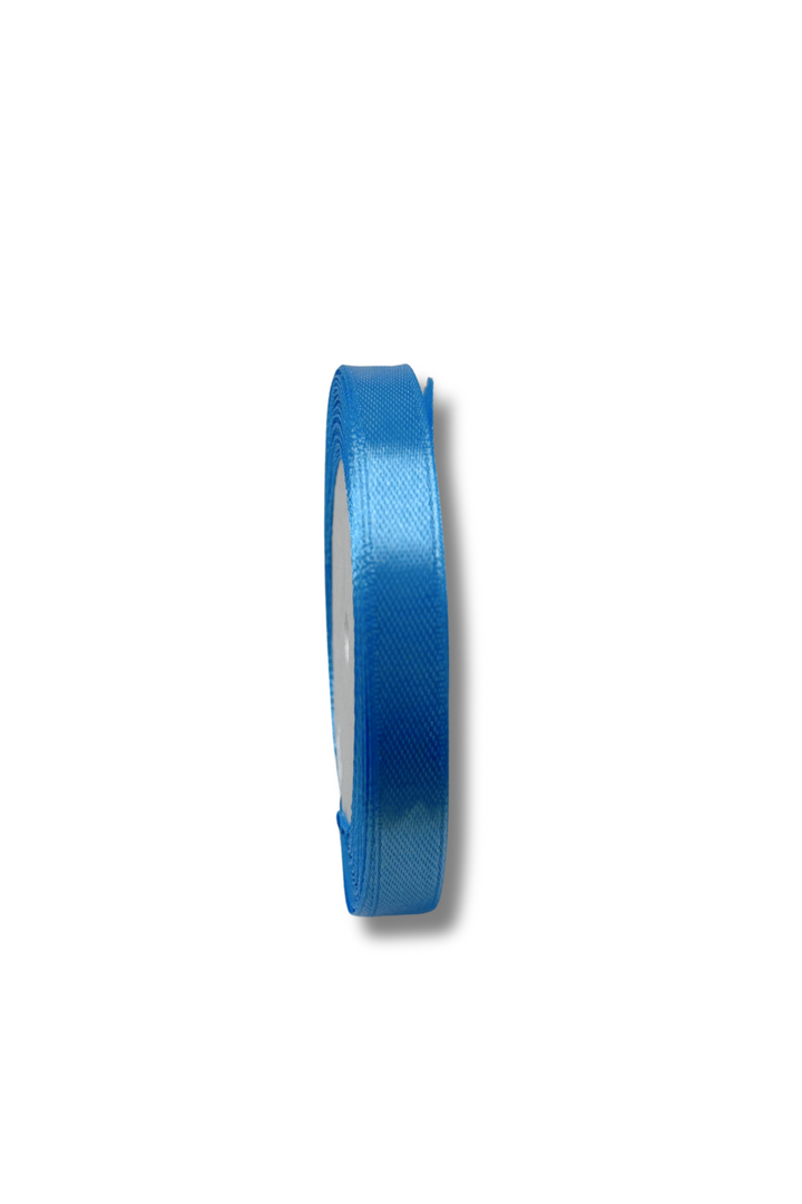 A spool of Super Cheap Fabrics Satin Ribbon - 10 Colours - 10mm, 21m long in shiny blue, stands upright on a plain white background with a soft shadow.