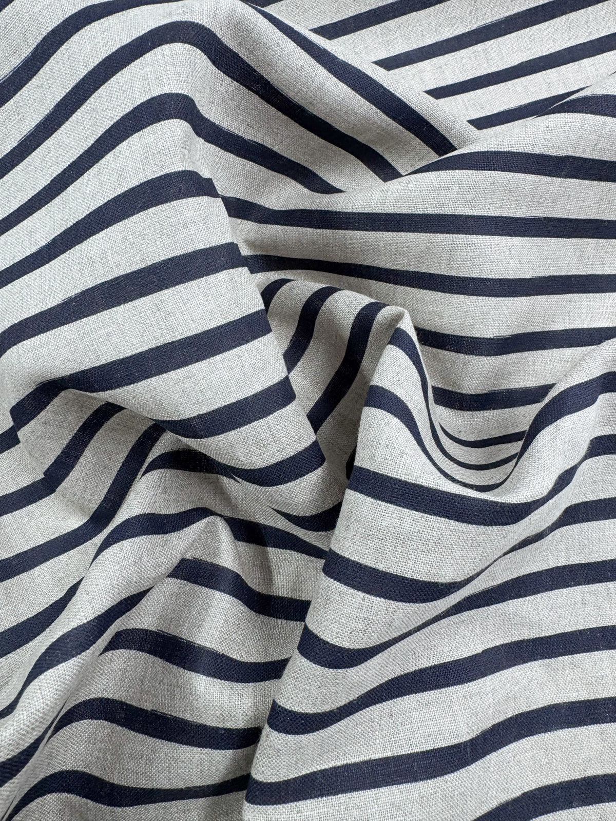 Close-up of safari print navy linen showing the design