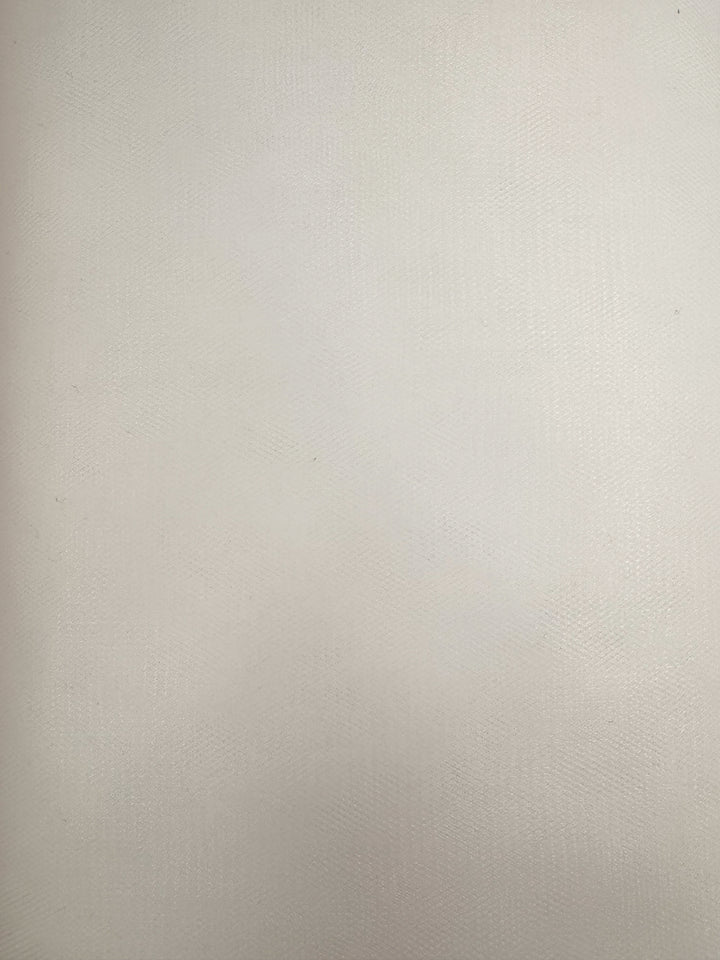 A close-up of Soft Tulle in Cream by Super Cheap Fabrics, showing its light beige, fabric-like texture and subtle weave, similar to material used for bridal veils. The 150cm fabric is evenly lit with no distinct markings visible.