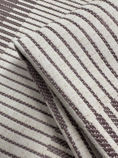 A close-up of Striped Woven Upholstery - Melmoth by Super Cheap Fabrics (142cm), featuring a burlwood-inspired beige fabric with brown linear and diagonal stripes, showcasing its thick, durable texture.