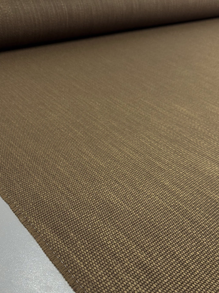 A close-up of Super Cheap Fabrics' Grid Upholstery - Yari 014 (147cm) in earthy brown, laid flat to display its detailed weaving and smooth, heavy-duty finish.