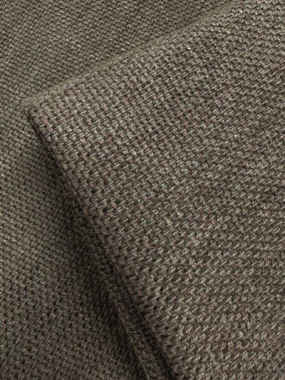 Close-up of Super Cheap Fabrics’ Textured Woven Upholstery – Osaka Clay (143cm), highlighting its heavy weave, brown tone, and detailed fibers—ideal for adding rustic appeal to furniture.
