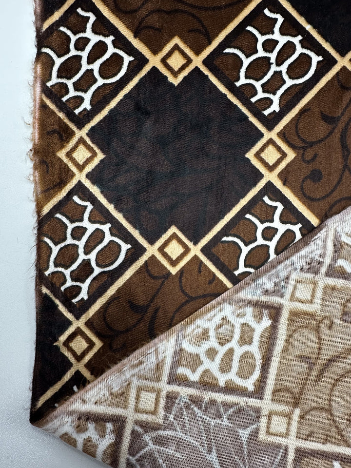 Super Cheap Fabrics’ DD Velvet - Regal Lattice (154cm) is a medium-weight, 100% polyester velvet with a geometric brown, black, and beige diamond pattern; the reverse shows a lighter version of the same stylish design.