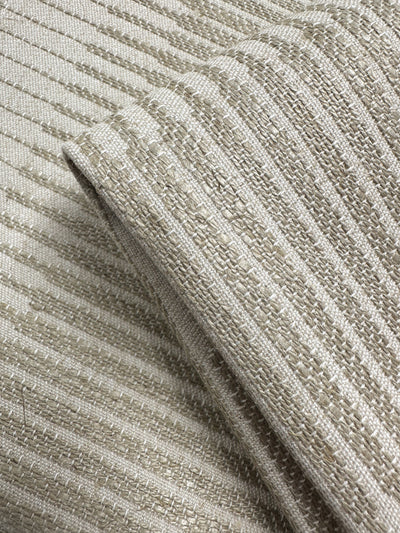 Close-up of Textured Jacquard Upholstery - Melmoth Stripe Nat (142cm) by Super Cheap Fabrics, featuring a beige ribbed pattern with a soft sheen—highlighting its thick, woven structure, perfect for premium upholstery projects.