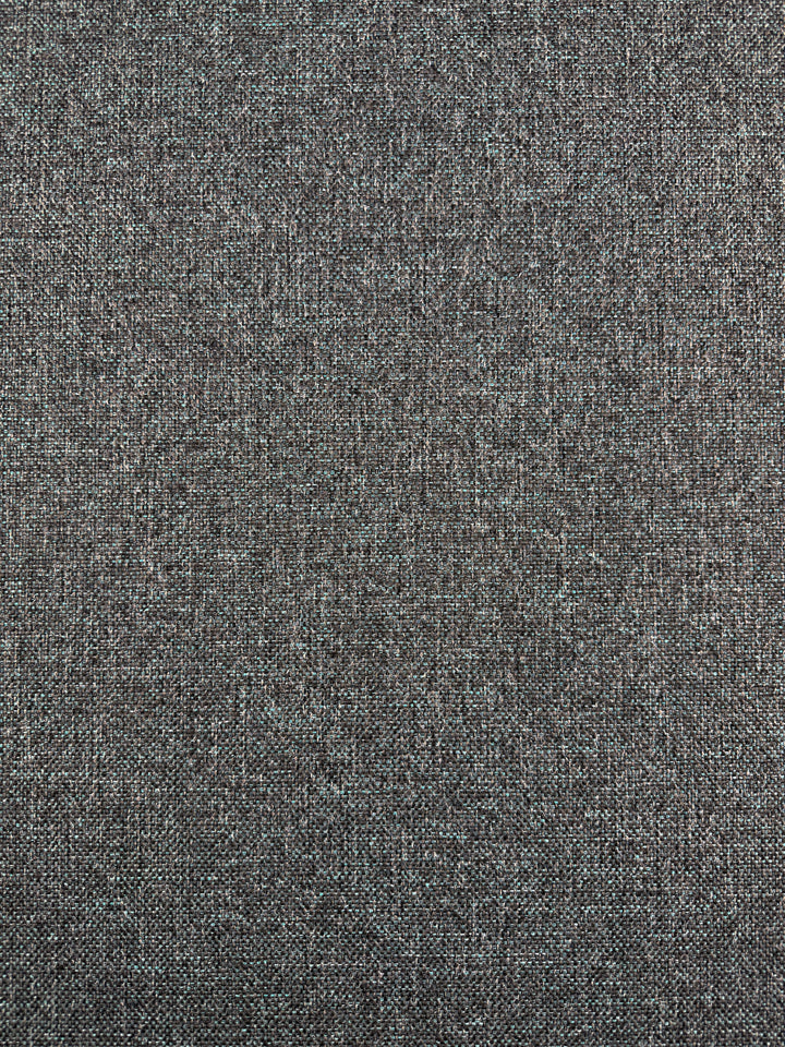 Close-up of Soho Topaz upholstery fabric by Super Cheap Fabrics, 150cm wide, featuring textured gray woven threads and a soft yet slightly rough surface—perfect as a medium weight option for sofas.