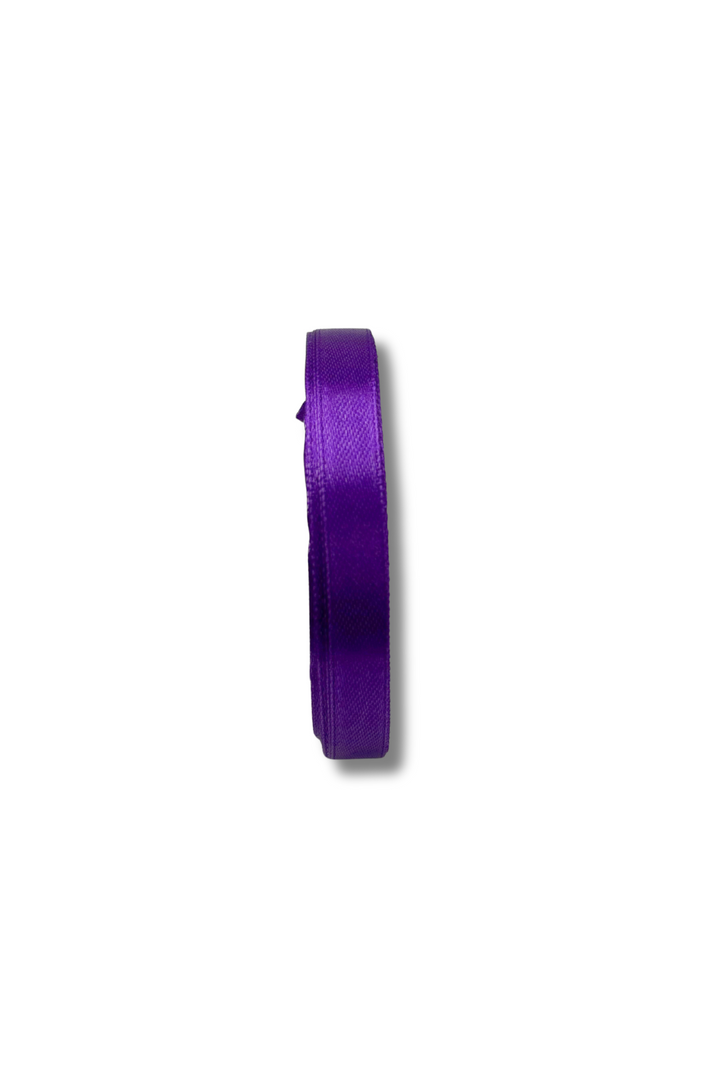 A single roll of Super Cheap Fabrics Satin Ribbon - 10 Colours - 10mm, vibrant purple, 21m length, displayed from the side against a plain white background.