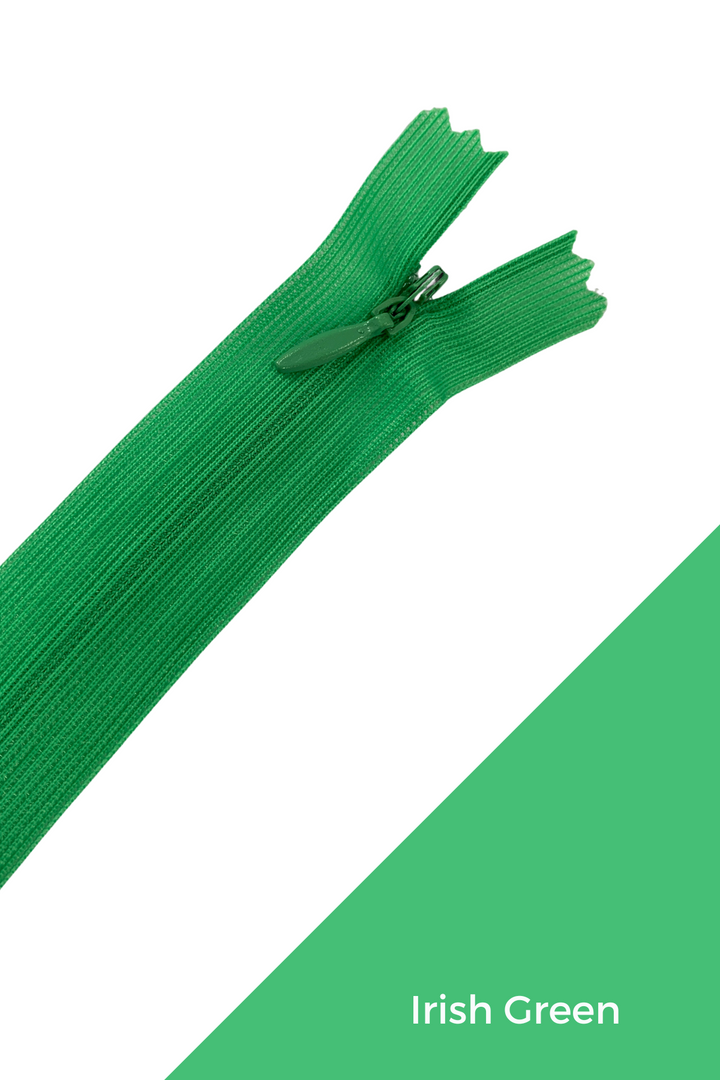 A close-up of the Super Cheap Fabrics Invisible Zip - 30cm - Greens in Irish Green polyester, shown on a white background with a diagonal green section labeled "Irish Green" in white text.