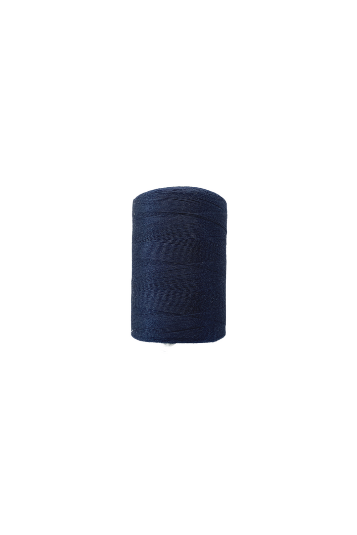 A large spool of "Thread - Navy" by Super Cheap Fabrics, made from durable polyester, stands upright against a plain white background.