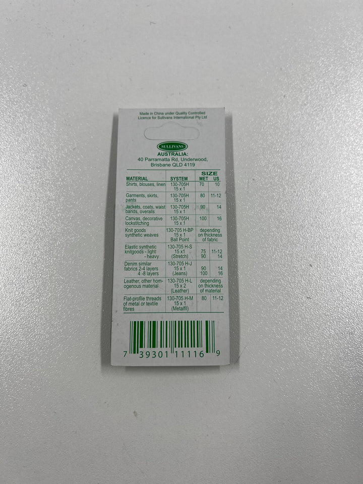 A size guide chart from Super Cheap Fabrics for Machine Needles - 5 Stretch shows their uses and European/US sizes (11-12/75). The guide is printed on white paper with green text and a barcode at the bottom.